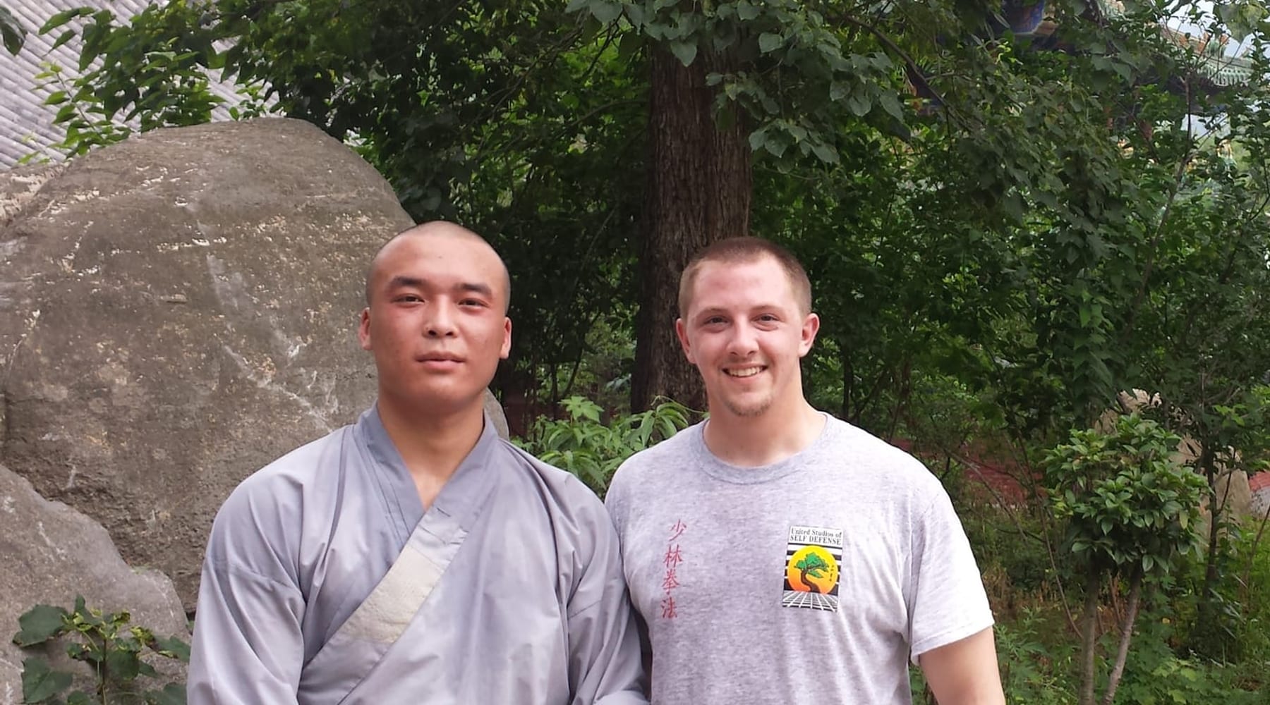 A United Studios of Self Defense member with a monk at the Shaolin Temple in China, 2013.