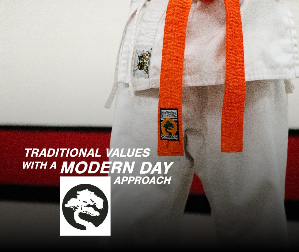 A student's white gi and orange United Studios of Self Defense belt, captioned 'Traditional values with a modern day approach.'